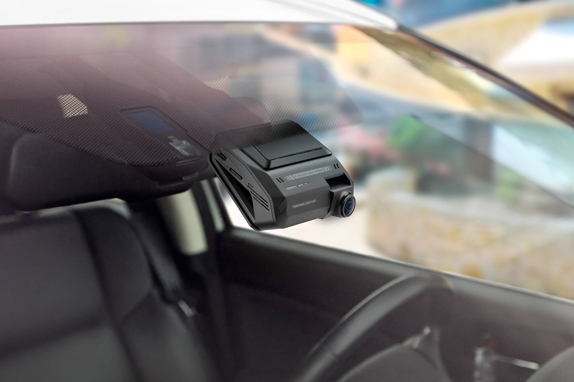 The text on the image reads: "THINKWARE DASH CAM"