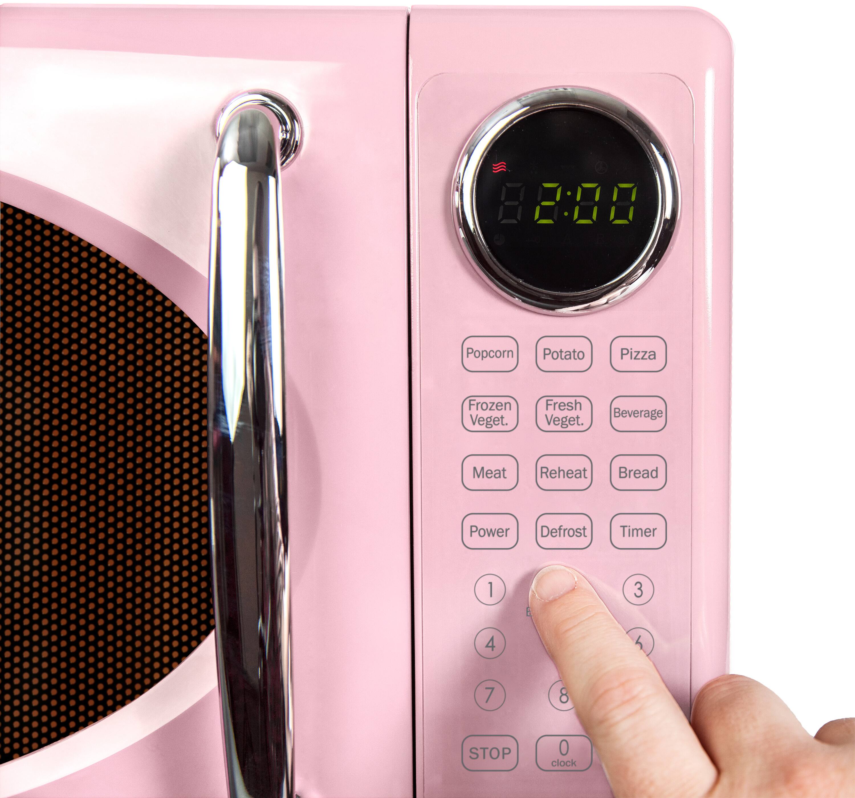 8:08 Popcorn Potato Pizza Frozen Veget. Fresh Veget. Beverage Meat Reheat Bread Power Defrost Timer 1 2 3 4 5 6 7 8 STOP 0 clock