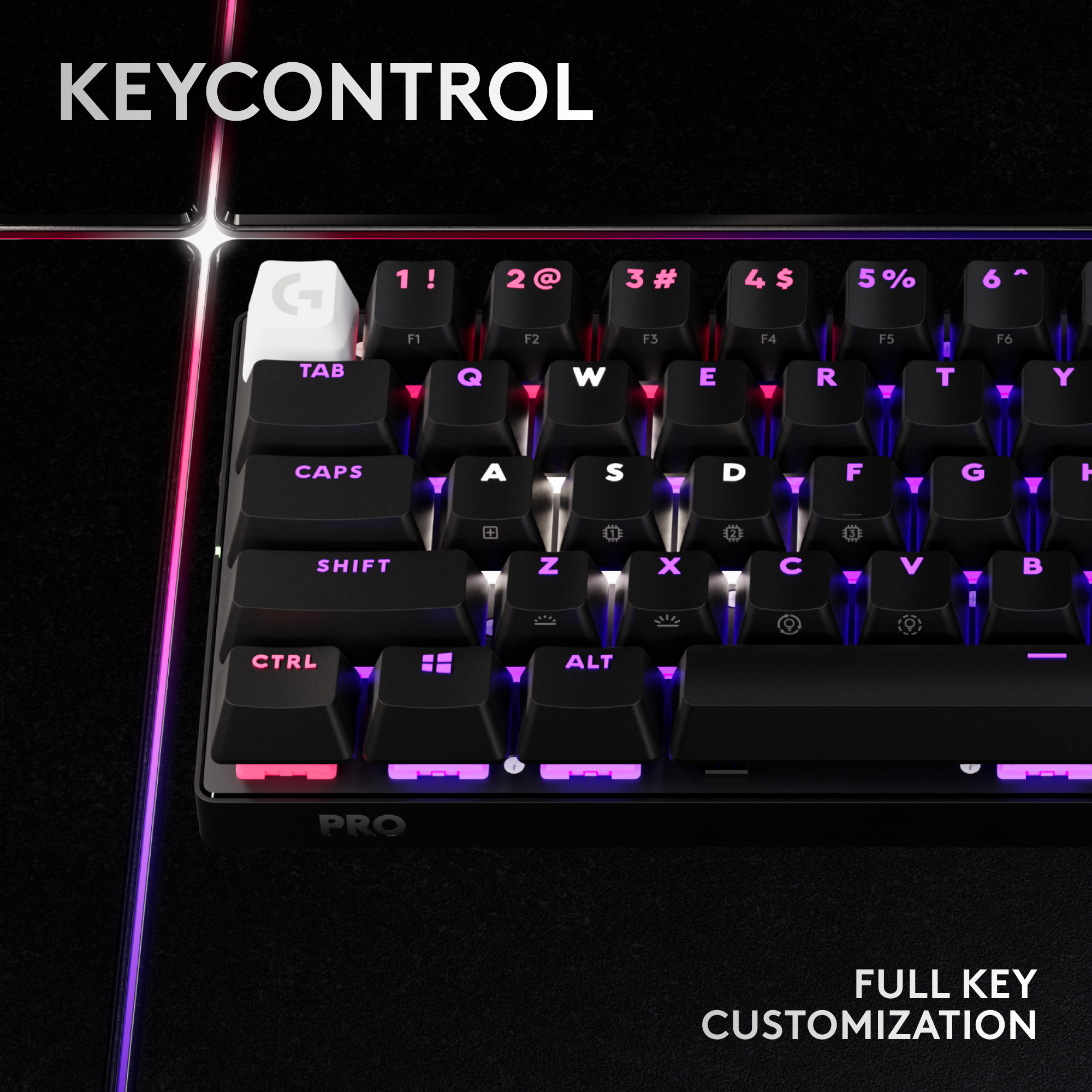 The image shows a close-up of a keyboard with a purple and black color scheme. The keyboard is labeled "KEYCONTROL" and features a full key customization option. The keys are arranged in a way that allows for easy typing and navigation. The keyboard is designed to provide a comfortable and efficient typing experience for users.
