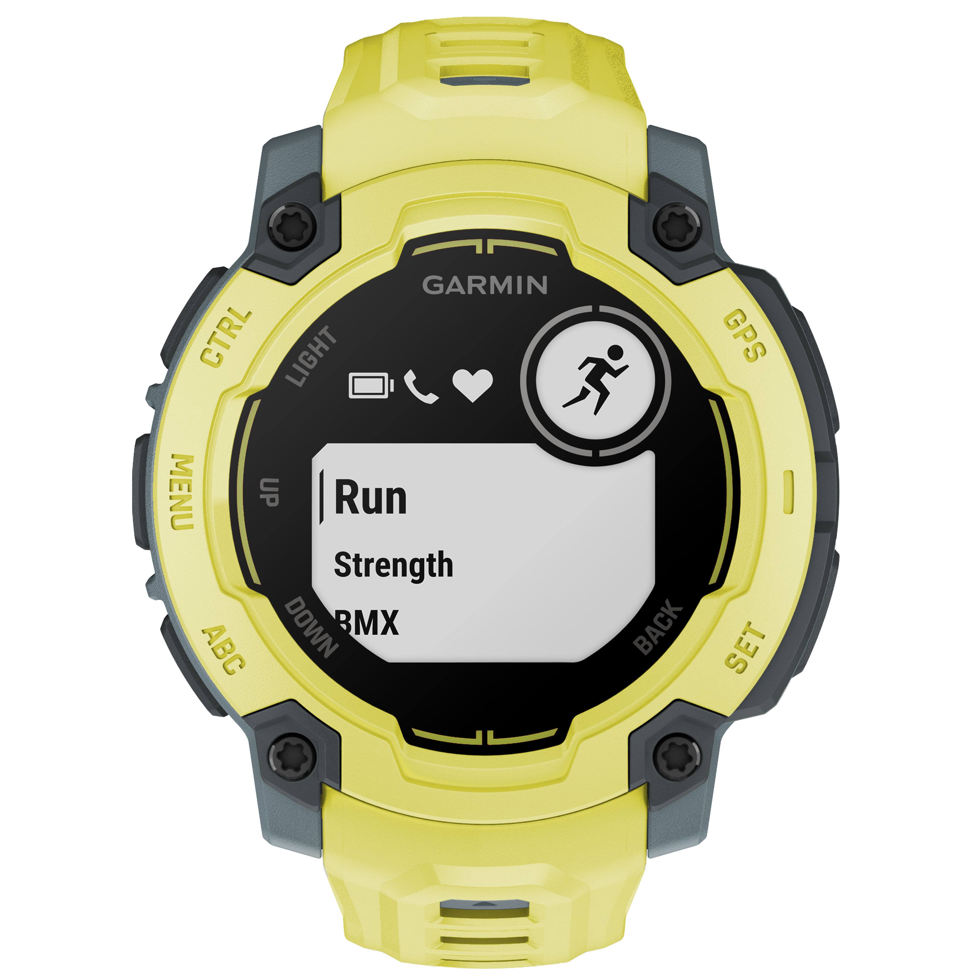 Garmin watch with a yellow face and black numbers. The watch has a "Run Strength" option on the screen.
