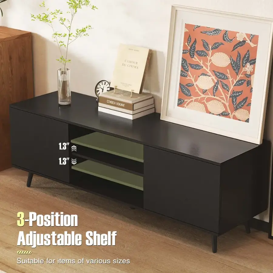 The image features a black 3-position adjustable shelf, suitable for items of various sizes. The shelf is placed on a table, and there are several books and a vase nearby. The books are arranged in a stack, and the vase is positioned towards the left side of the shelf. The shelf is designed to accommodate items of different heights, making it a versatile and practical storage solution.