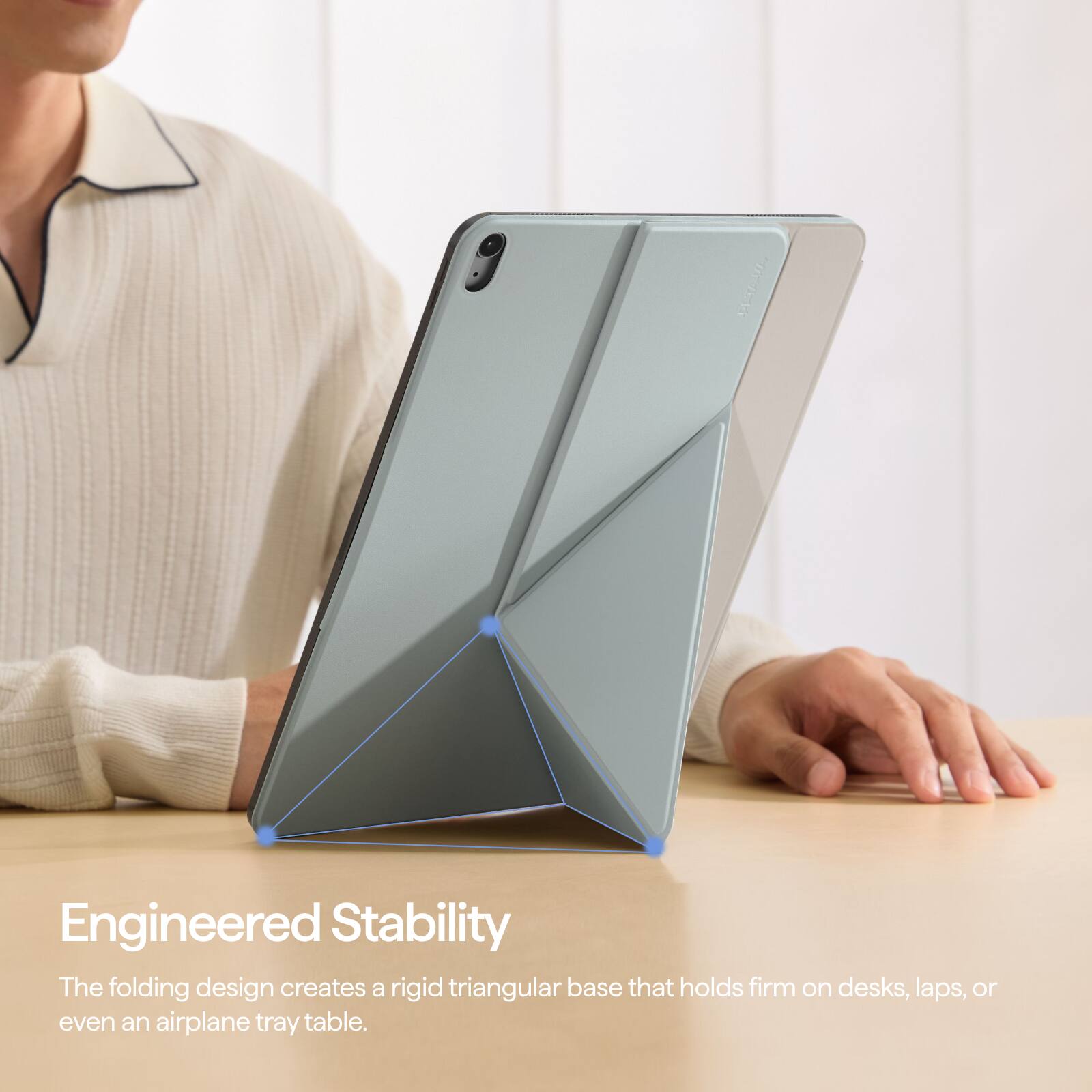 Engineered Stability  
The folding design creates a rigid triangular base that holds firm on desks, laps, or even an airplane tray table.