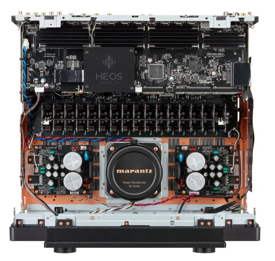 The text on the image reads "HEOS BUILT IN marantz Power Transformer for Audio i."