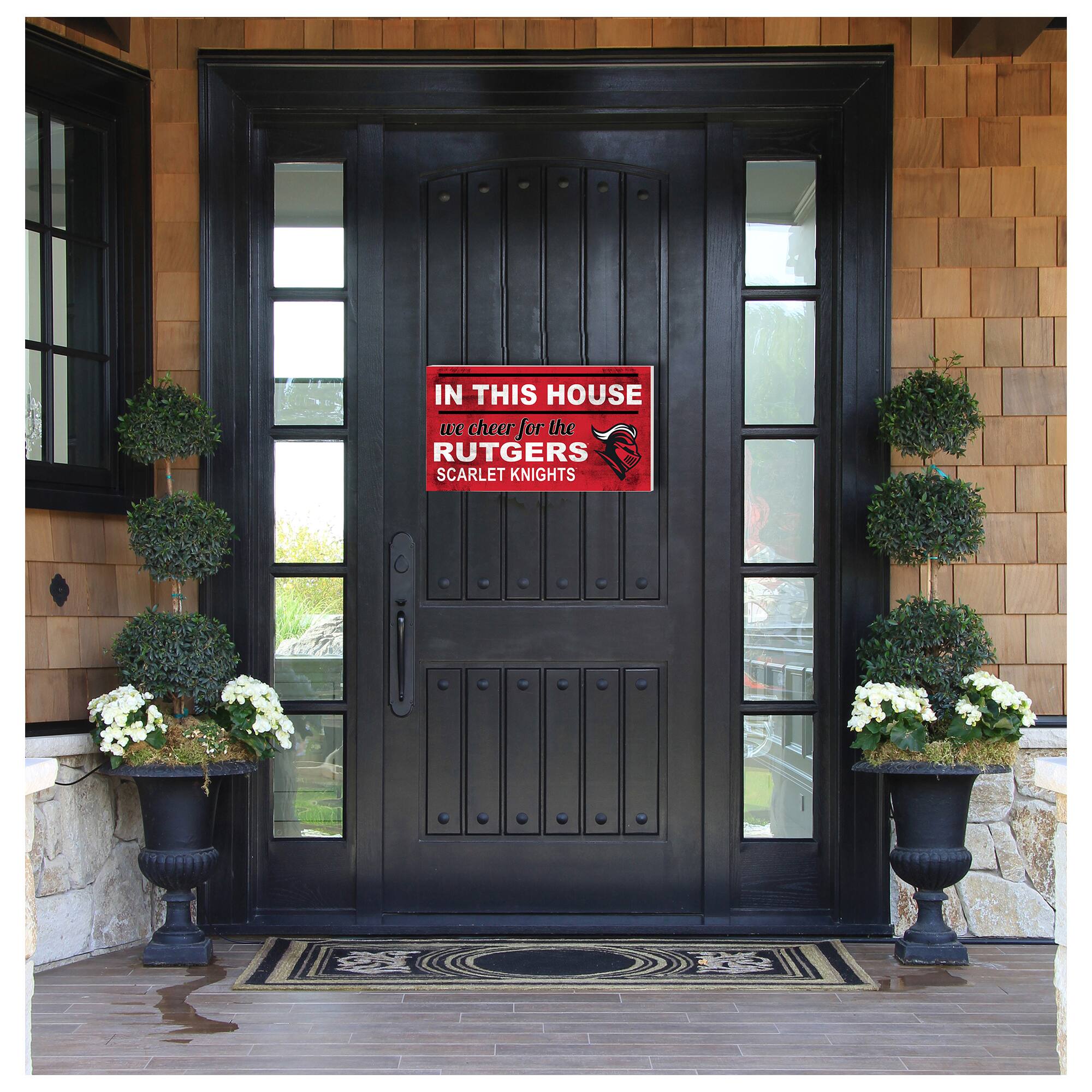 IN THIS HOUSE  
we cheer for the  
RUTGERS  
SCARLET KNIGHTS