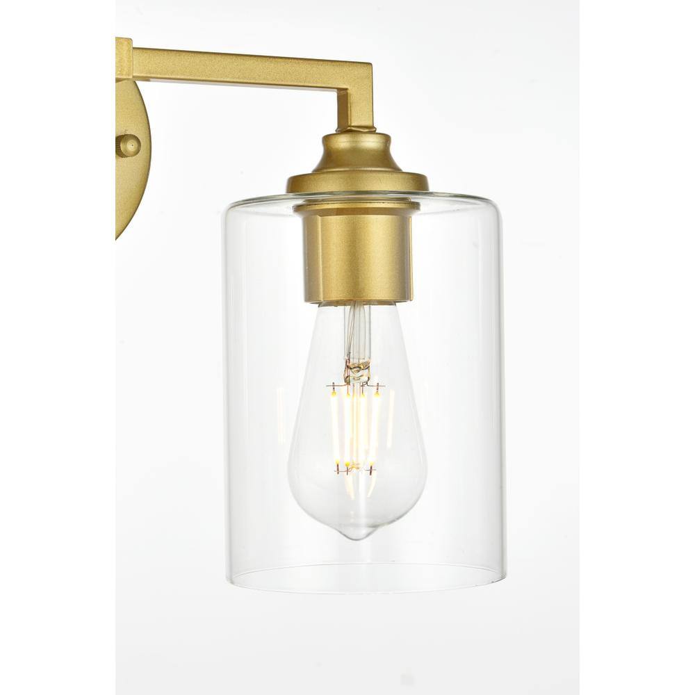 Left. Living District - Mayson 2 light Brass and Clear Bath Sconce - Brass And Clear.
