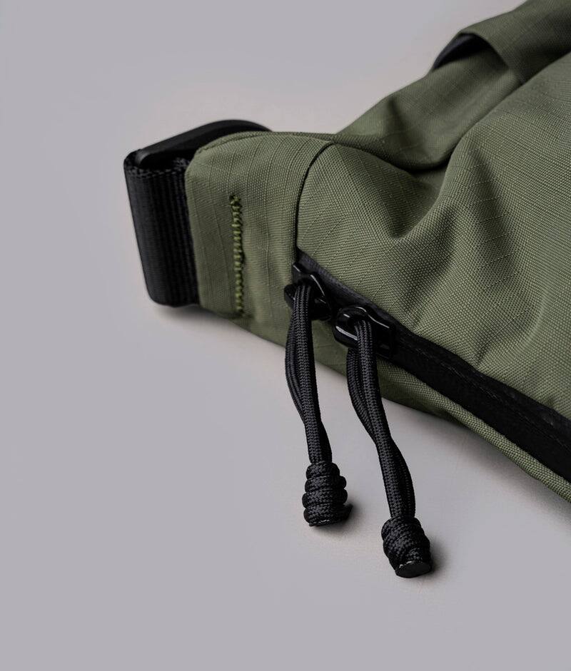 Alt View 8. ALPAKA - Laptop Messenger Satchel Bag 11L for Work & Travel, Fits 13" MacBook Air, Bottle Pockets, Luggage Pass-Through - Green Axoflux 210D.