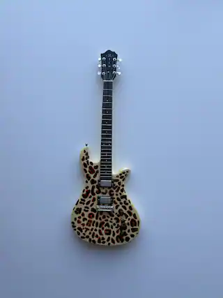 Front. Axe Heaven - Axe Heaven Eagle Leopard Mini Guitar Replica BC-582 - COLLECTIBLES - Multicolor.