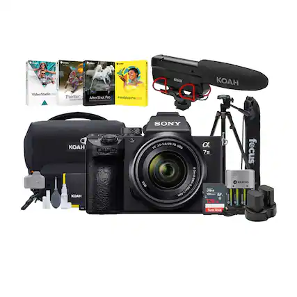 The image features a Sony camera and various accessories, including a tripod, a microphone, and a bag. The camera is placed in the center of the image, surrounded by the other items. The tripod is located to the right of the camera, while the microphone is positioned above and slightly to the left of the camera. The bag is situated to the left of the camera, and there are also some books scattered around the scene.