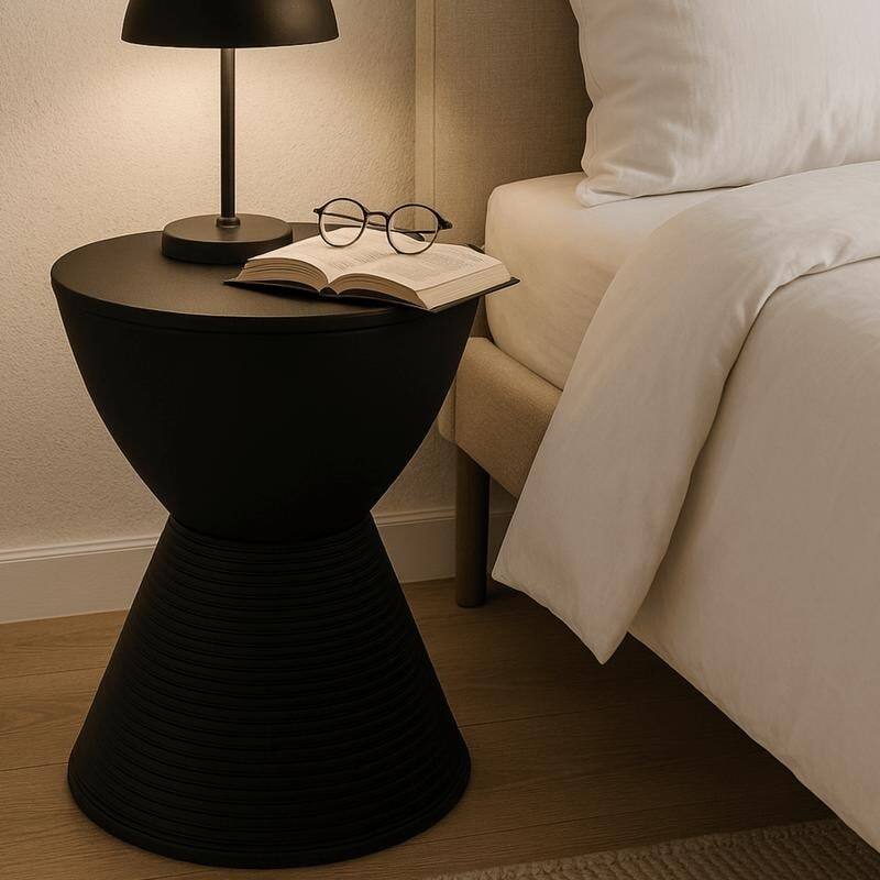 Angle. LeisureMod - Boyd Modern Round Hourglass Accent Side Table, Drum Storage Table with Ribbed Base for Indoor/Outdoor - Black.