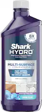 The text on the image reads: "Shark Hydro Multi-Surface Concentrate Fast Drying. Streak-Free. No Sticky Residue. Refill 16 oz (473mL) Designed for all sealed hard floors. Odor Neutralizer. Spring Clean."