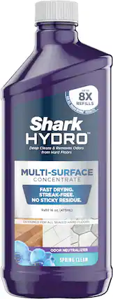 The text on the image reads: "Shark Hydro Multi-Surface Concentrate Fast Drying. Streak-Free. No Sticky Residue. Refill 16 oz (473mL) Designed for all sealed hard floors. Odor Neutralizer. Spring Clean."