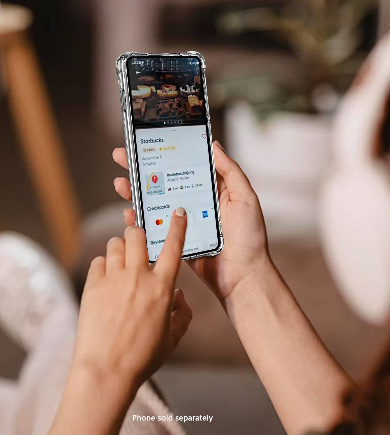 The text on the image reads: "2209 Starbucks Cale's J Arpont Peer C Schiphot Routebeschrjving Afstand 9 im 1H i 3m Schunel 1- Creditcards Review don ack Ajd Phone sold separately."