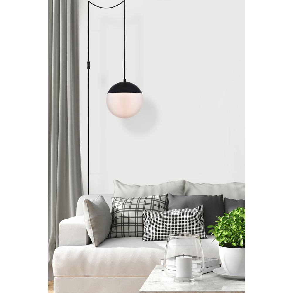 Angle. Living District - Eclipse 1 Light Black plug in pendant With Frosted White Glass - Black And Frosted White.