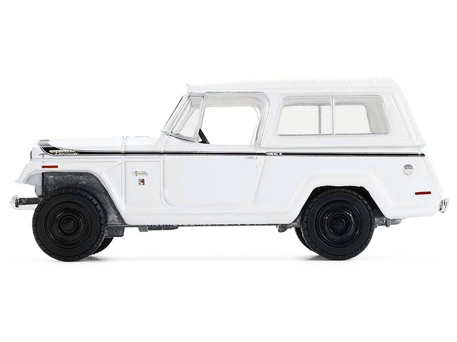 Alt View 2. Greenlight - 1971 Jeep Jeepster Commando White with Black Stripes "All Terrain" Series 1/64 Diecast Model Car by Greenlight.