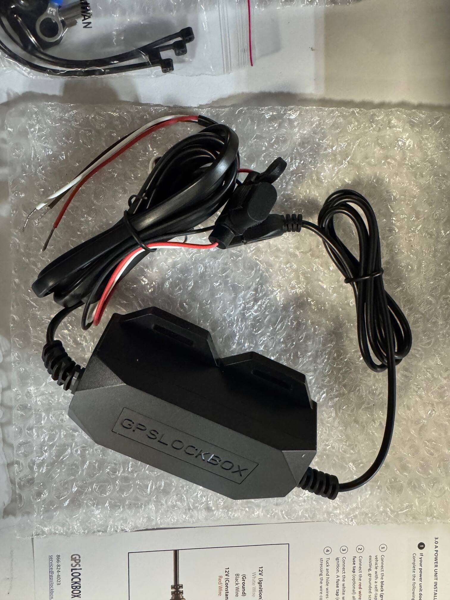 GPSLOCKBOX  
service@gpslockbox.com  
866-824-4023  

GPSLOCKBOX  
12V Red Wire  
Constant Black (Ground) Wire  
12V White Wire (Ignition)  

1. Connect the 12V (Constant) wire to the red wire.  
2. Connect the black (Ground) wire to the black wire.  
3. Connect the 12V (Ignition) wire to the white wire.  
4. Tuck the wires and hide them.  
5. Connect the optional wire to the existing vehicle ground.  
6. Complete the power unit installation.  

3.0A POWER UNIT INSTALL