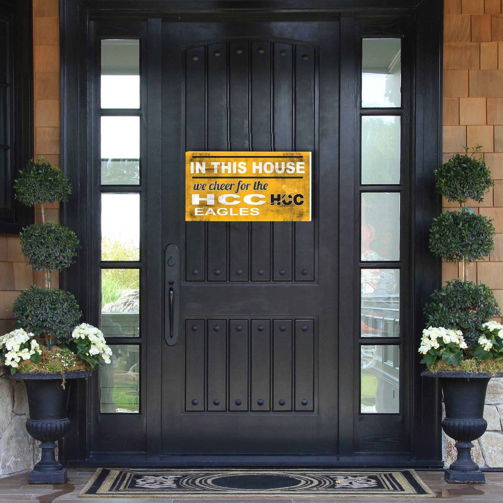 IN THIS HOUSE  
we cheer for the  
HCC EAGLES