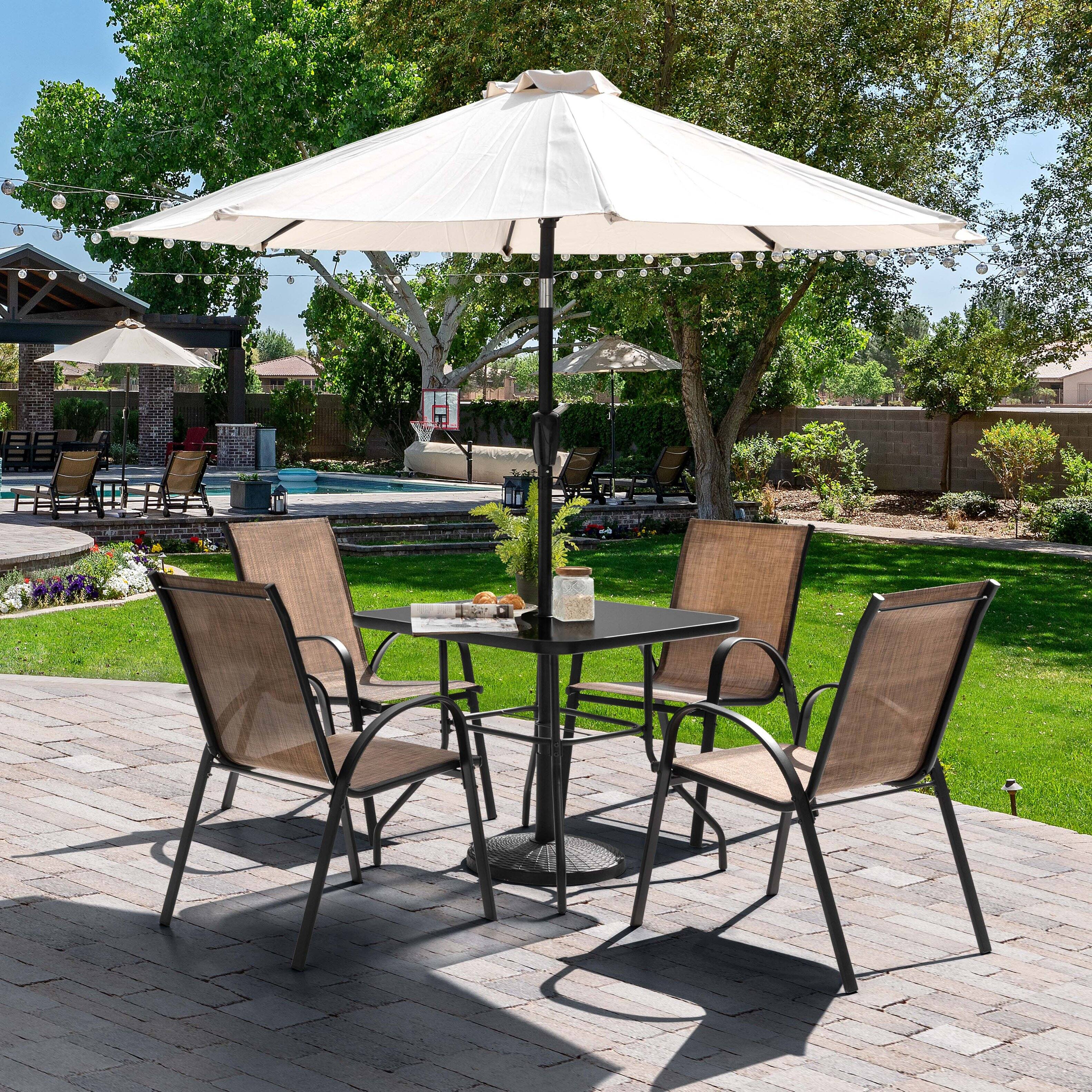 Left. Nuu Garden - 5-Piece Metal and Textilene Outdoor Dining Set, 4 Stackable Chairs and Tempered Glass Table with Umbrella Hole - Black and Brown.