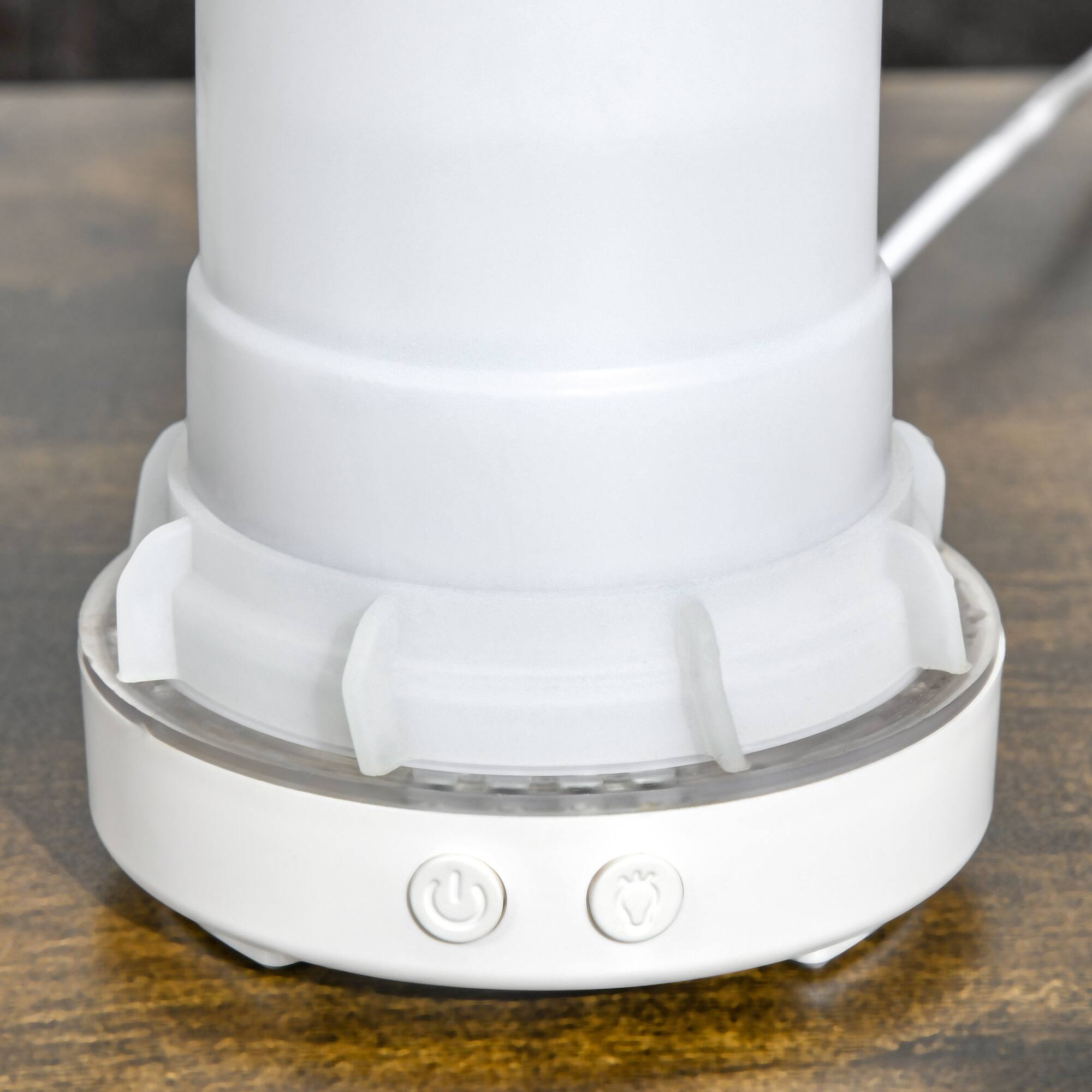 Alt View 8. Homcom - 100ml Ultrasonic Aromatherapy Diffuser, Essential Oils Humidifier with Ceramic Cover, 7 Colors LED Lights, Timer, Water - White.