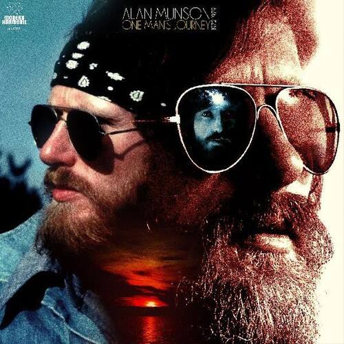 MOBERE HARMONIE  
ALAN MUNSON '977  
ONE MAN'S JOURNEY
