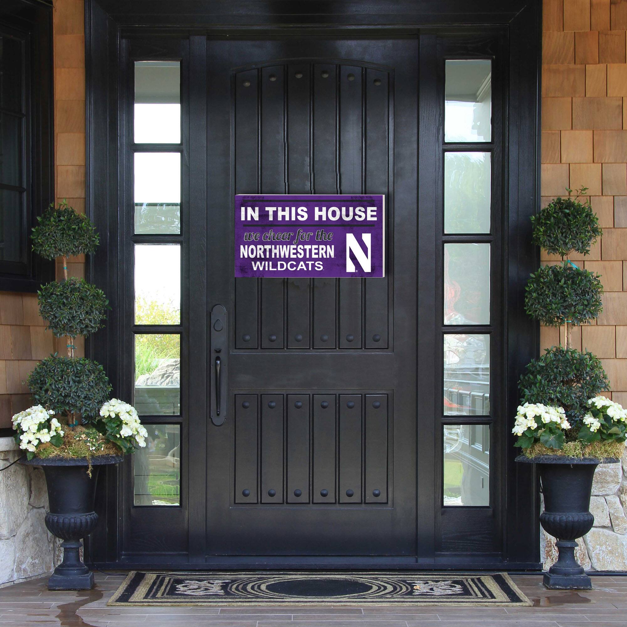 IN THIS HOUSE  
we cheer for the  
NORTHWESTERN WILDCATS