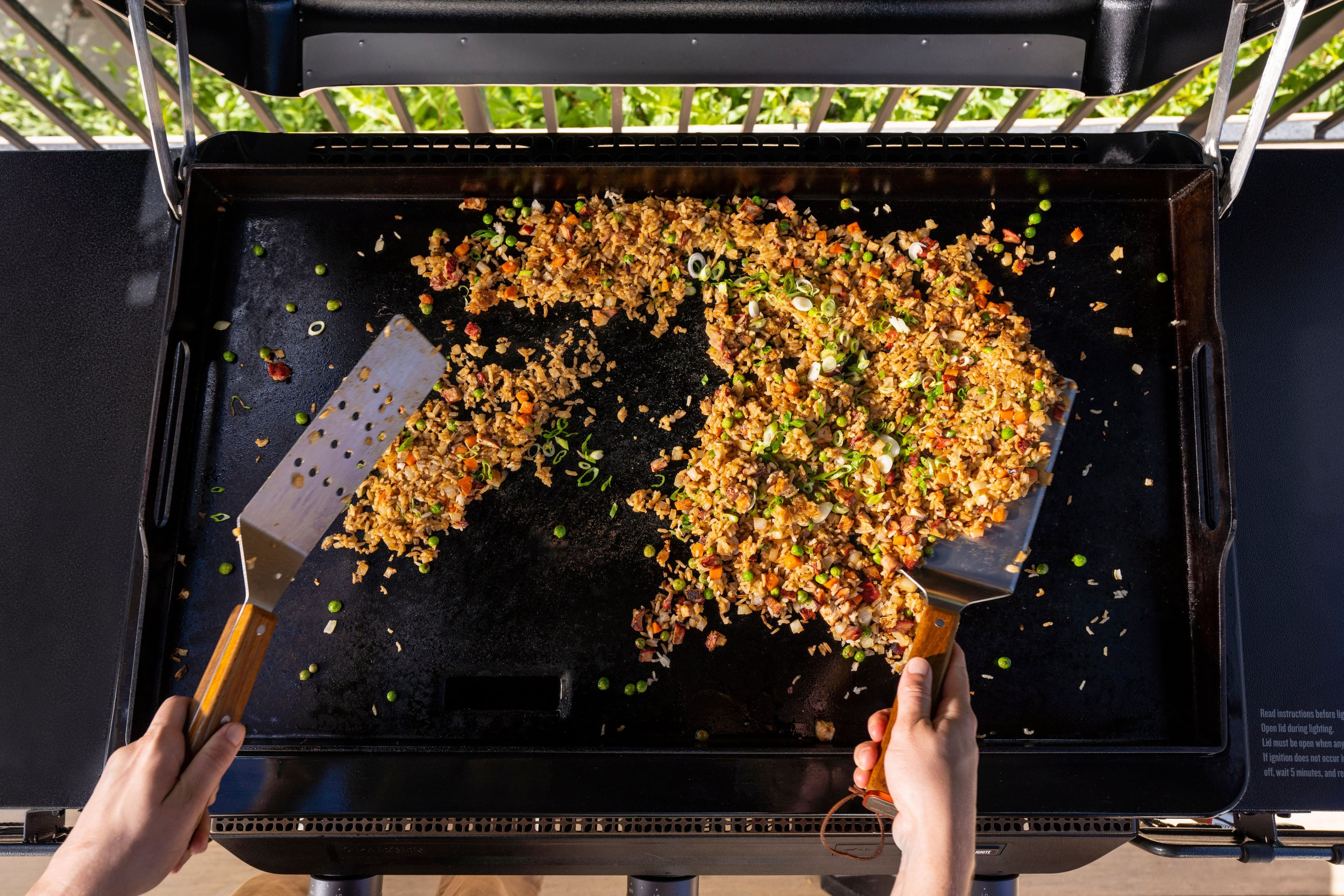 Before I open the grill, read the instructions to ensure it's properly lit and ready for cooking. The grill should be open when the ignition is turned on, and it should be lit for at least 10 minutes before cooking begins.