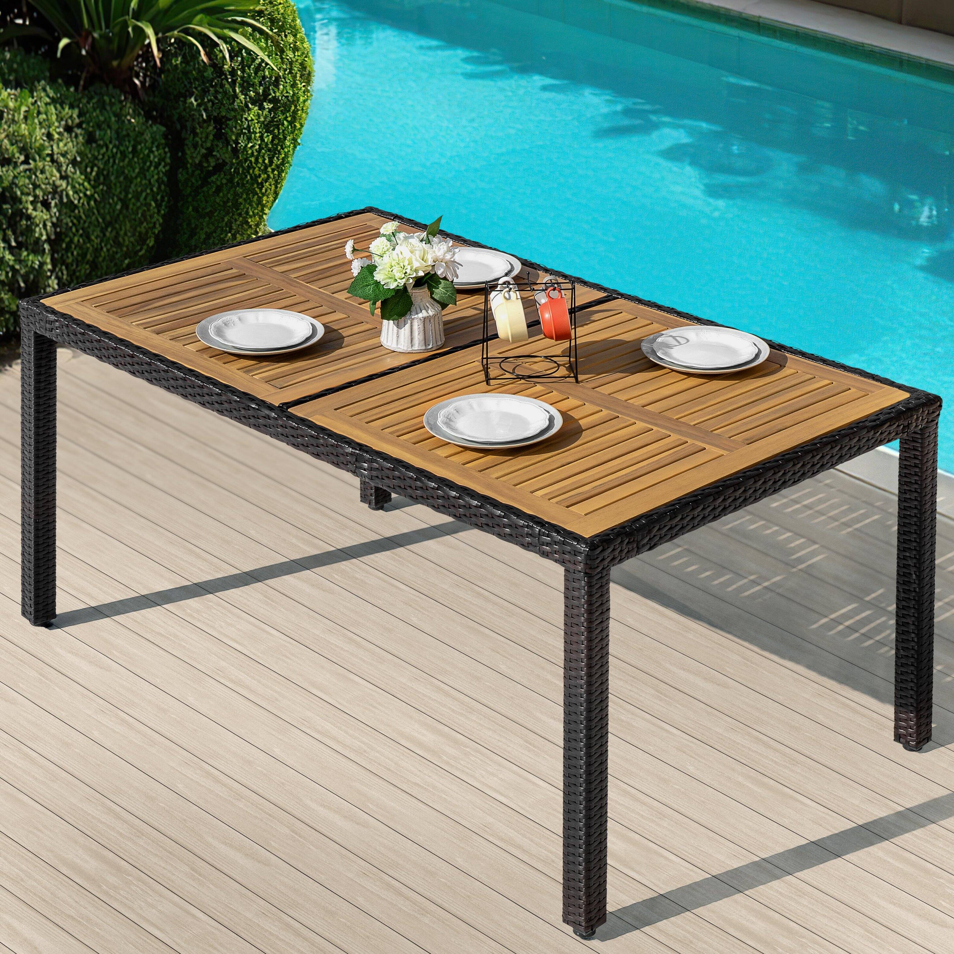 Left. Nuu Garden - Outdoor 59" x 35" Rectangular Dining Table for 6 with Acacia Wood Slatted Tabletop, PE Rattan-Wrapped Metal Frame - Black.