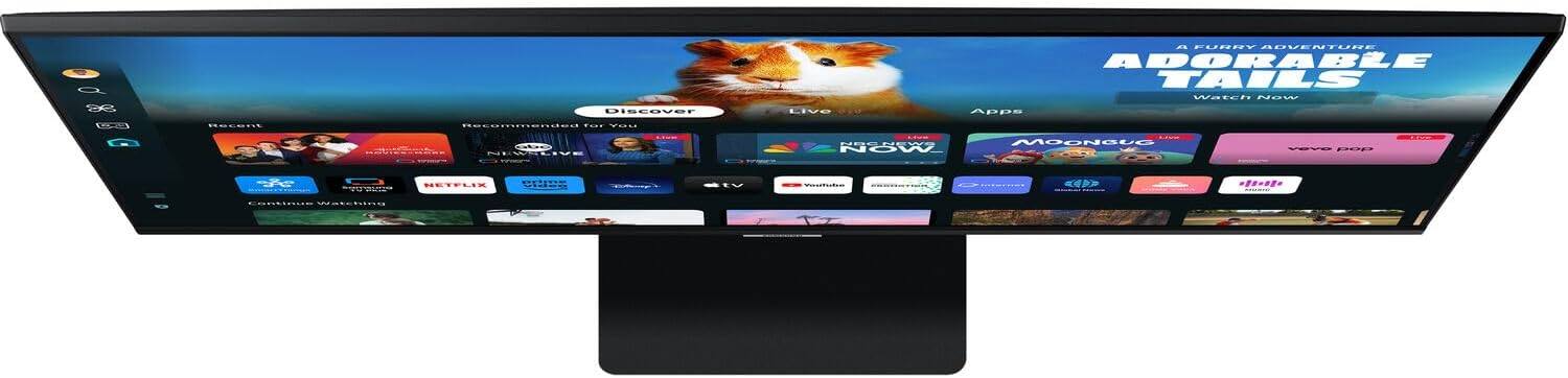 Sure, here is the corrected and grouped text from the image:

---

**Top Banner:**
- A FURRY ADVENTURE
- ADORABLE TAILS
- Watch Now

**Menu Bar:**
- Discover
- Live
- Apps

**Discover Section:**
- Recommended for You
- Continue Watching

**Live Section:**
- NOW
- MOONGUC
- YouTube
- vevo pop

**Apps Section:**
- Netflix
- Disney+
- TV
- YouTube
- Amazon Prime Video
- BBC iPlayer
- Sky News
- BBC Sport
- ITV
- Channel 4
- Channel 5

**Recent Section:**
- (Various thumbnails with titles not fully visible)

**Bottom Banner:**
- (Various app icons with titles not fully visible)

---