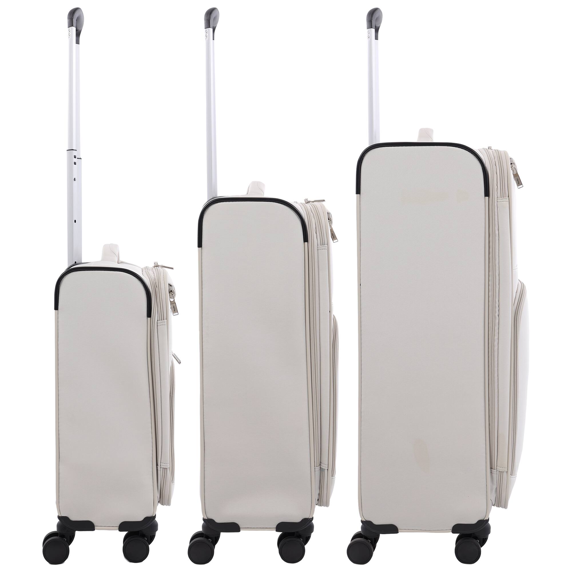 Left. Martha Stewart - 3-Piece Softside Luggage Set – 22" Carry-On, 27" Medium, 31" Large – 8 Spinner Wheels, Expandable Softshell - LIGHT GREY.