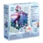 The image features a box containing a Frozen-themed art kit, which includes a window art mosaic, a story book, and a gem sheet. The box also contains a set of stickers and a tool for applying the stickers. The kit is designed for children and is easy to remove and store. The box has a warning label, indicating that it is not suitable for children under three years old due to small parts and potential choking hazards. The kit is made by Disney and can be found at makeitrealplay.com.