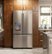 Alt View Zoom 13. Café Series 27.8 Cu. Ft. French Door Refrigerator with Thru-the-Door Ice and Water - Stainless steel.