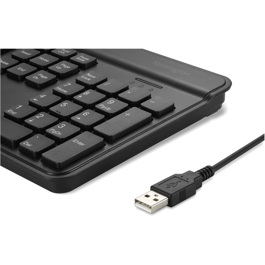 Sure, here is the corrected and grouped text from the image:

- Insert
- Look
- Sn
- Home
- Beak
- Pase
- Ceintr
- End
- UP
- Page
- Dn
- Page
- Lock
- Num
- 1
- Home
- 8
- 4
- 1
- 9
- 1
- 5
- PaUp
- End
- I
- 9
- 2
- 3
- PgDn
- Del
- Enter
- Kensington

The keys visible on the keyboard are:

- Insert
- Home
- End
- Page Up
- Page Down
- Num Lock
- 1
- 2
- 3
- 4
- 5
- 6
- 7
- 8
- 9
- 0
- Delete
- Enter

The brand name on the keyboard is "Kensington."