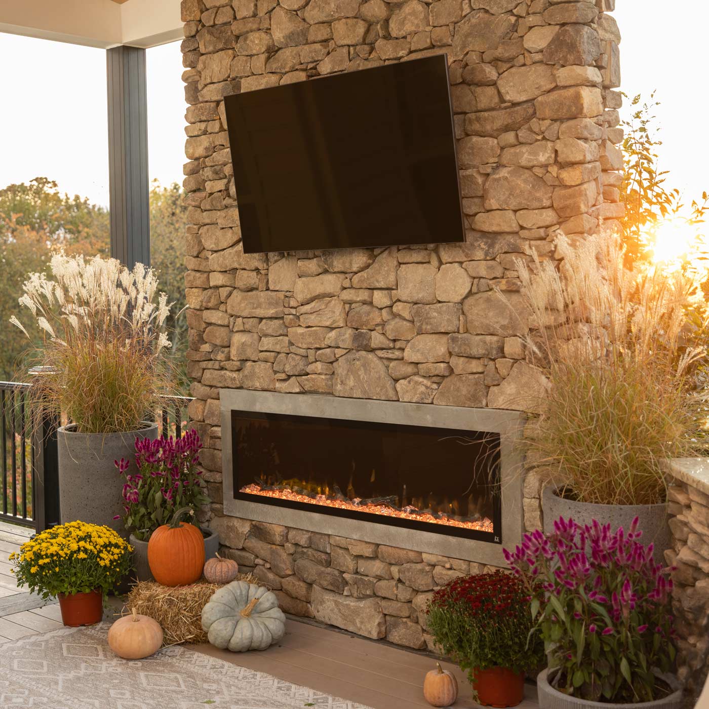 Angle. Touchstone Home Products - 60 in. Wall Mounted Recessed Sideline Elite Outdoor Smart Electric Fireplace - Black.