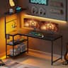 RSPGAME - 51.7 in. L-Shaped Gaming Desk with Power Outlets, Carbon Fiber Computer Desk with Storage Shelves - Black