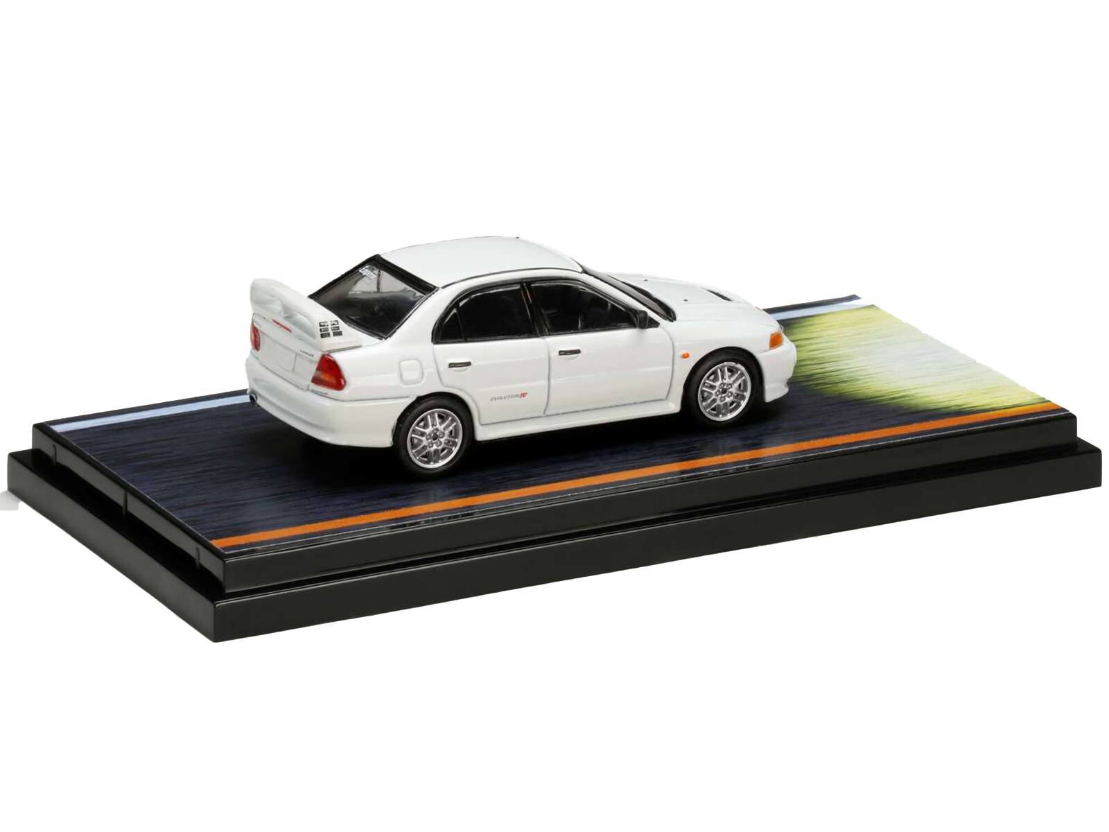Left. Hobby Japan - Mitsubishi Lancer RS Evolution IV RHD White Monstar with Seiji Iwaki Driver Figure Initial D 1/64 - White.