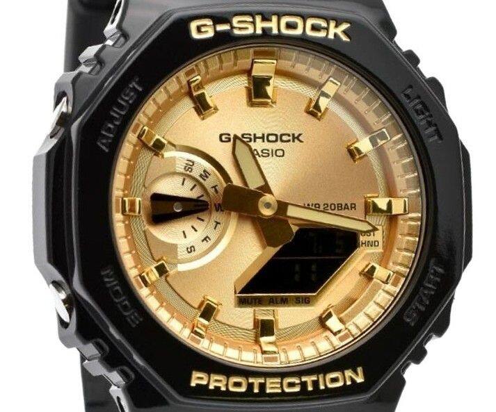G-SHOCK  
G-SHOCK  
CASIO  
WR 20BAR  
PROTECTION  
LIGHT  
ALARM  
SUN/MON  
TUE  
WED  
THU  
FRI  
SAT  
MODE  
MUTE ALM SIG  
START  
PROTECTION