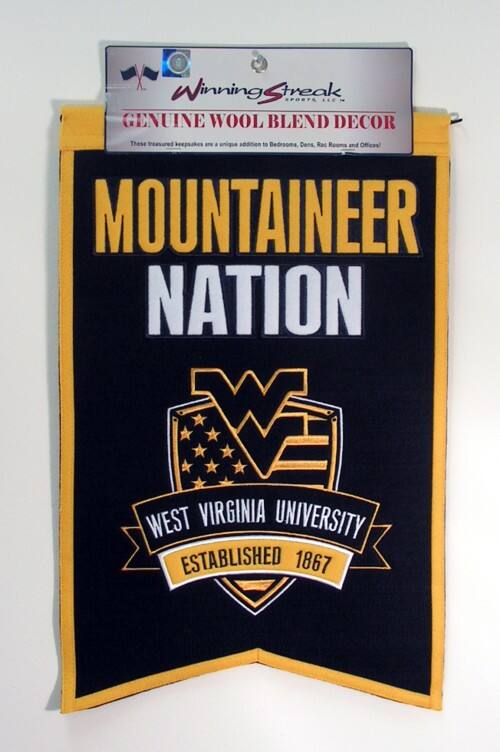 Winning Streak Sports LLC  
Genuine Wool Blend Decor  
These treasured keepsakes are a unique addition to Bedrooms, Dens, Rec Rooms and Offices!  

Mountaineer Nation  
West Virginia University  
Established 1867