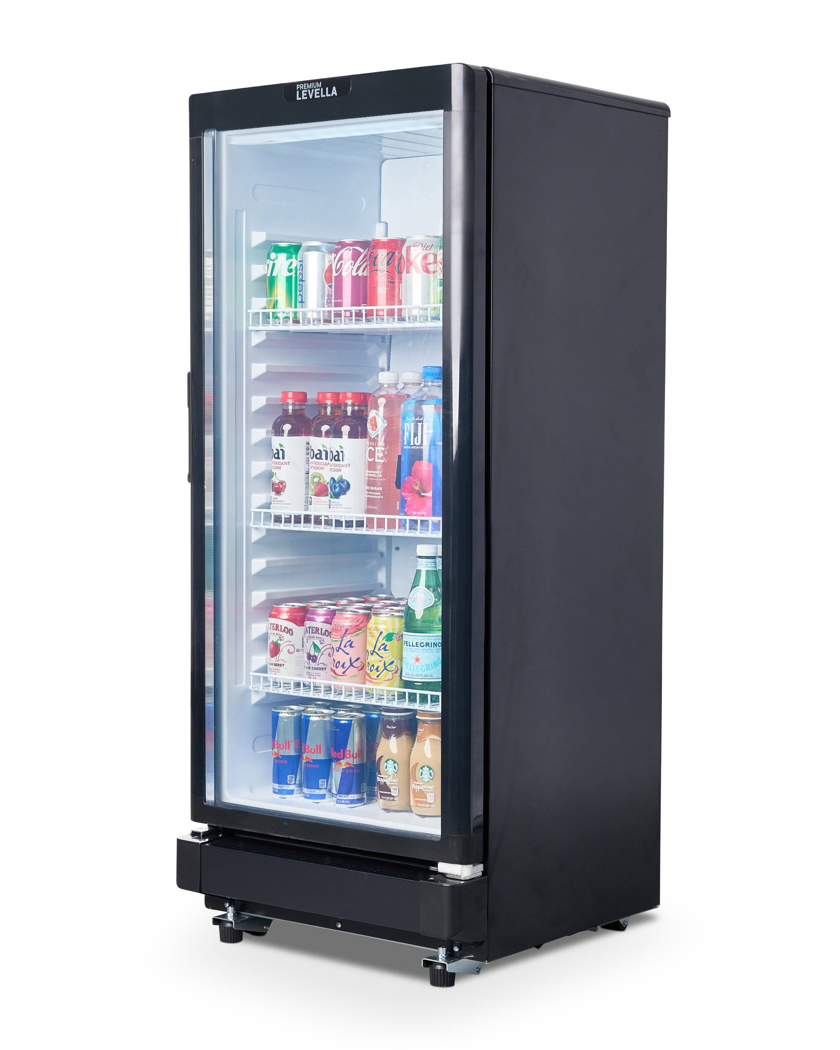 The image shows a black refrigerator with a variety of drinks inside. The drinks include several bottles of soda, such as Coca-Cola, and other beverages. The refrigerator is full, indicating a wide selection of drinks for people to choose from.