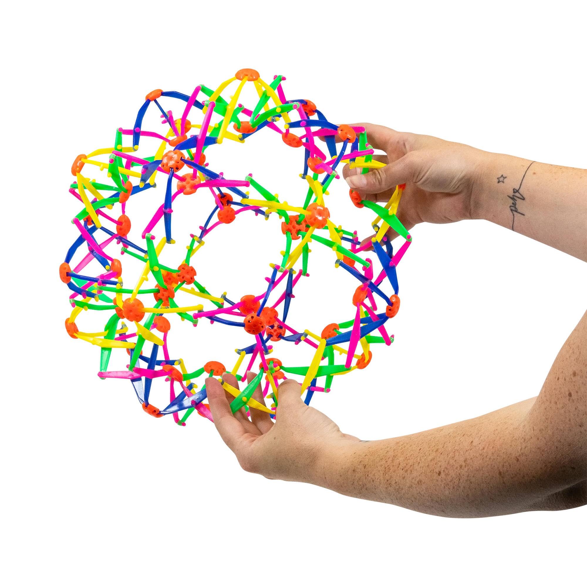 Alt View 1. One For Fun - Expandaball Expanding Sphere Ball, Geometric Stretch and Squeeze Play Ball for Kids - Multicolor.