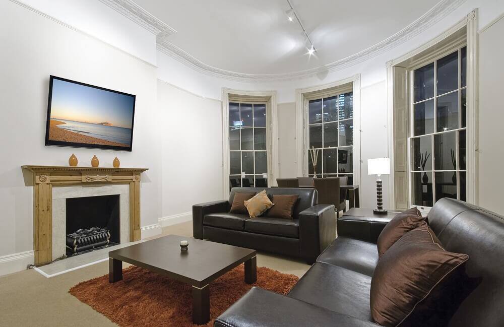Angle. Peerless-AV - Paramount  Universal Tilt Wall Mount For 39" to 90" TV's - Gloss Black.