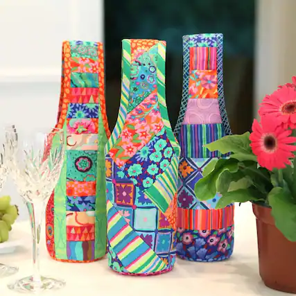 Front. AccuQuilt - JUNMN Quilt As You Go Wine Totes Sew by Number, White - Orange.