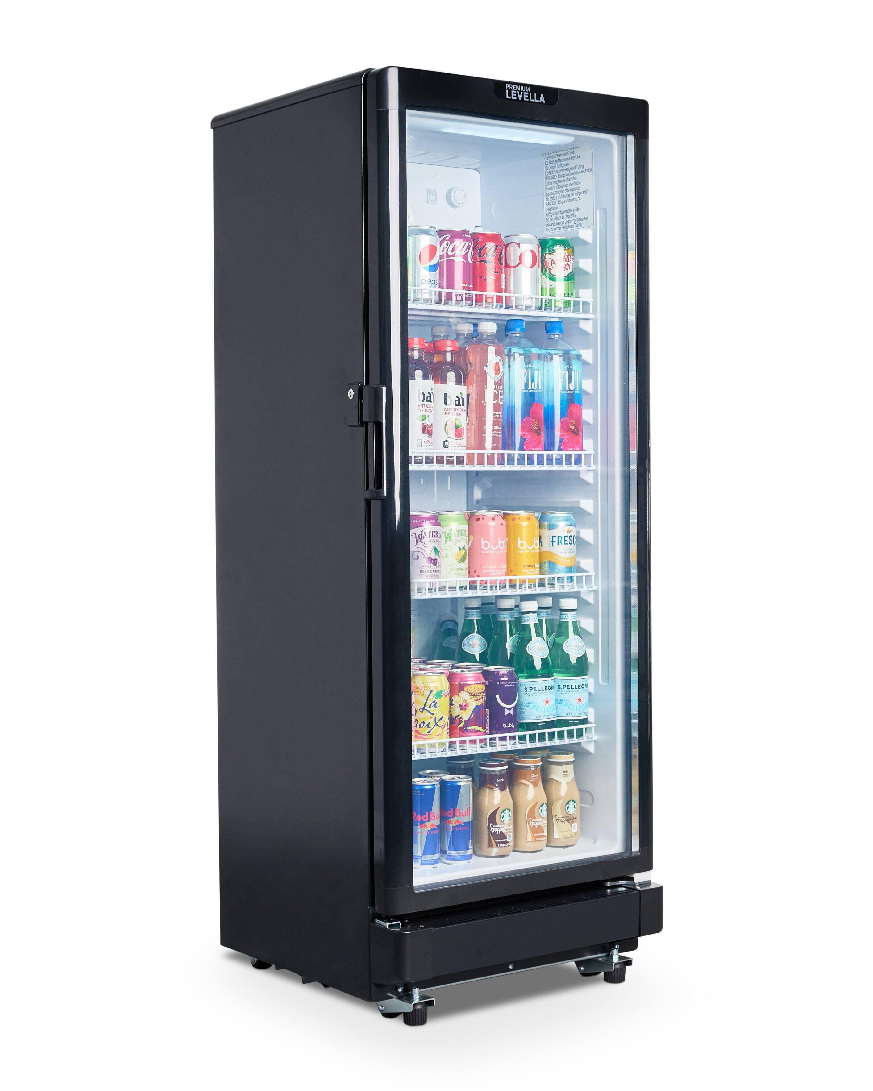 The image features a refrigerator with a variety of drinks inside. The drinks are organized in multiple shelves, with some bottles placed on the top shelf, some on the middle shelf, and others on the bottom shelf. The refrigerator is filled with a diverse selection of beverages, including both soda and water options. The refrigerator is black in color and has a large door, making it easy to access and store the drinks.