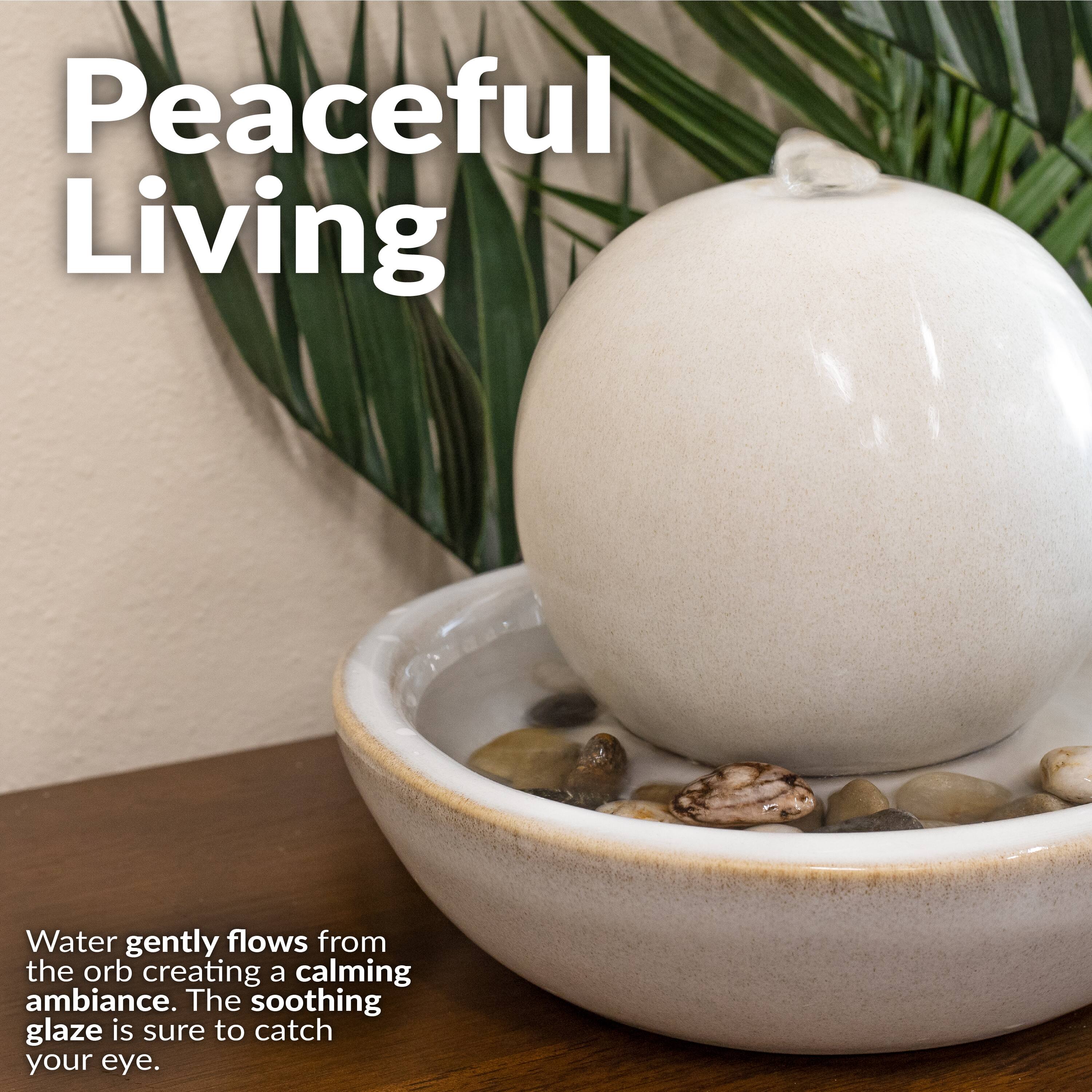 Peaceful Living

Water gently flows from the orb creating a calming ambiance. The soothing glaze is sure to catch your eye.
