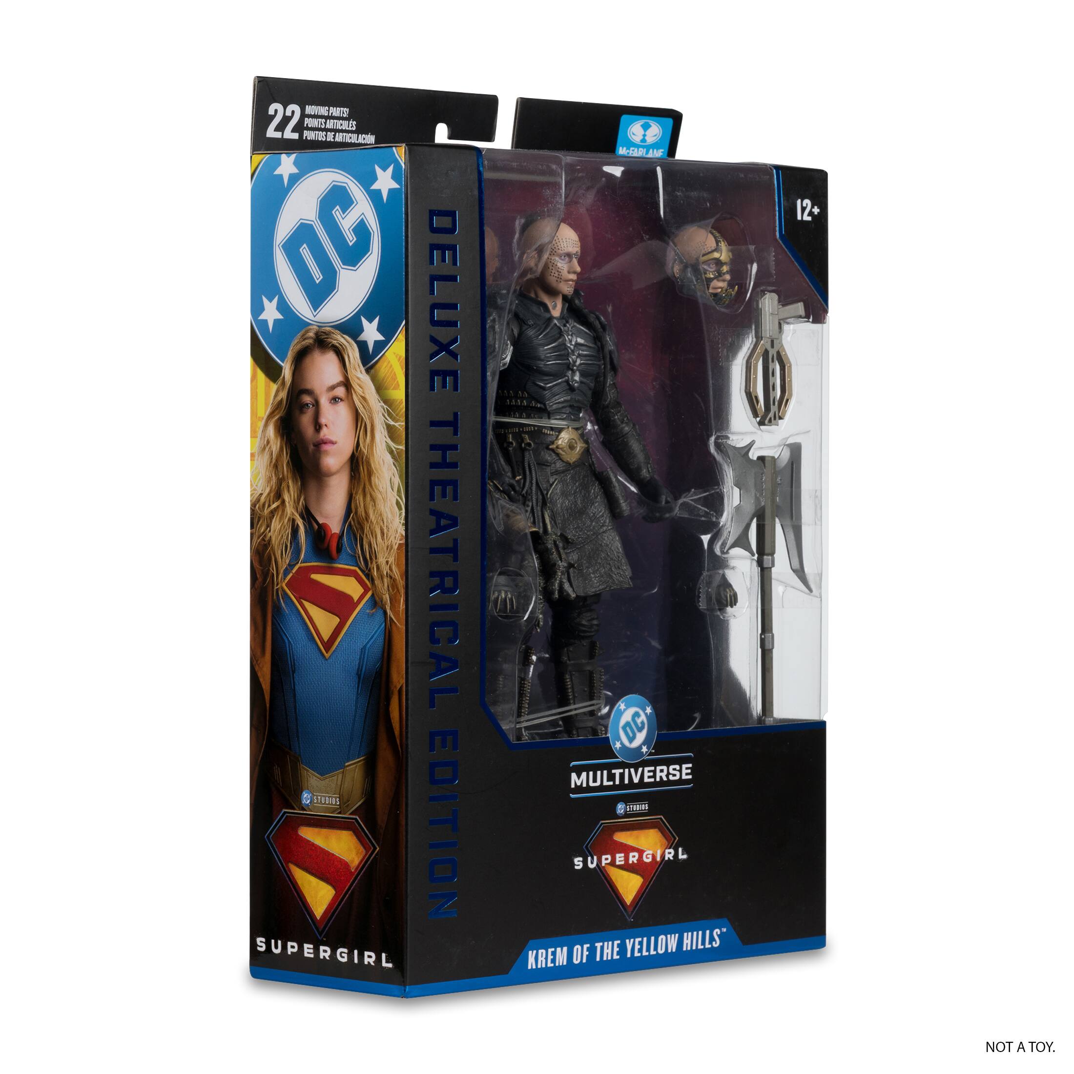 NONG - 22 PUNTES PRINTS ATICAES  
a - CC DC DELUXE THEATRICAL EDITION SUPERGIRL  
M-AARL.AN AM COAAS KAS d DC MULTIVERSE  
SUPERGIRL THE YELLOW HILLS" KREM OF 12+  
NOT A TOY.