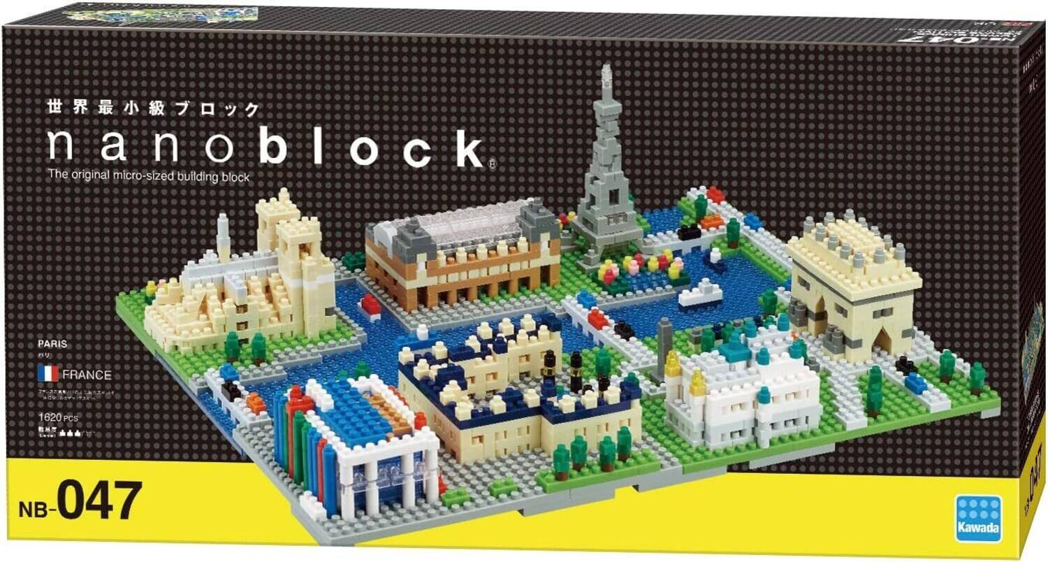 The text on the image is:

"nanoblock
The original micro-sized building block
PARIS
FRANCE
1620 PCS
NB-047
Kawada"

Corrected and grouped text:

"nanoblock
The original micro-sized building block
PARIS, FRANCE
1620 PCS
NB-047
Kawada"