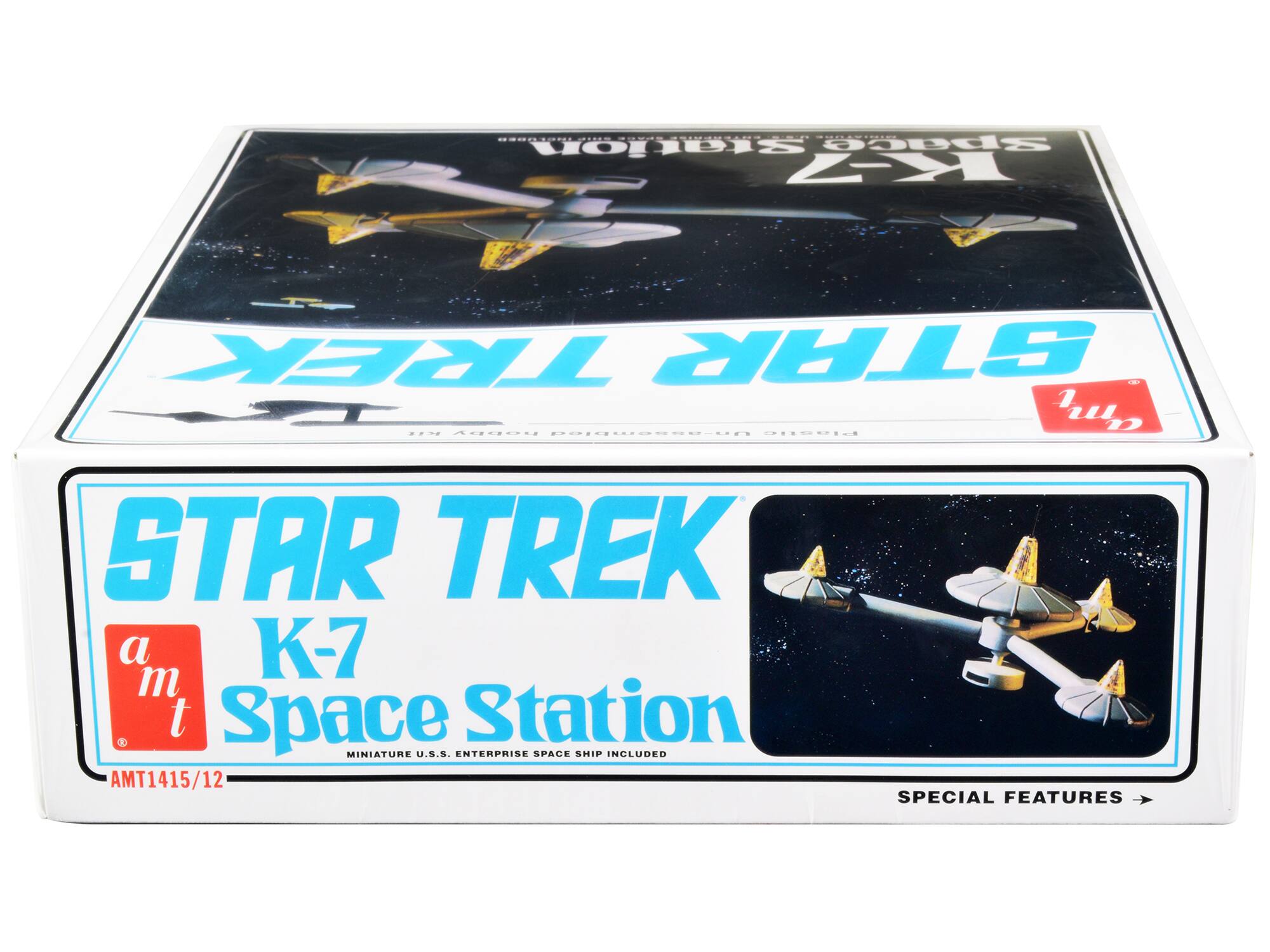 Sure, here is the corrected and grouped text from the image:

---

**STAR TREK**

**K-7 Space Station**

**a m t**

MINIATURE U.S.S. ENTERPRISE SPACE SHIP INCLUDED

**AMT1415/12**

SPECIAL FEATURES →

---

**STAR TREK**

**K-7 Space Station**

**a m t**

MINIATURE U.S.S. ENTERPRISE SPACE SHIP INCLUDED

**AMT1415/12**

SPECIAL FEATURES →

---
