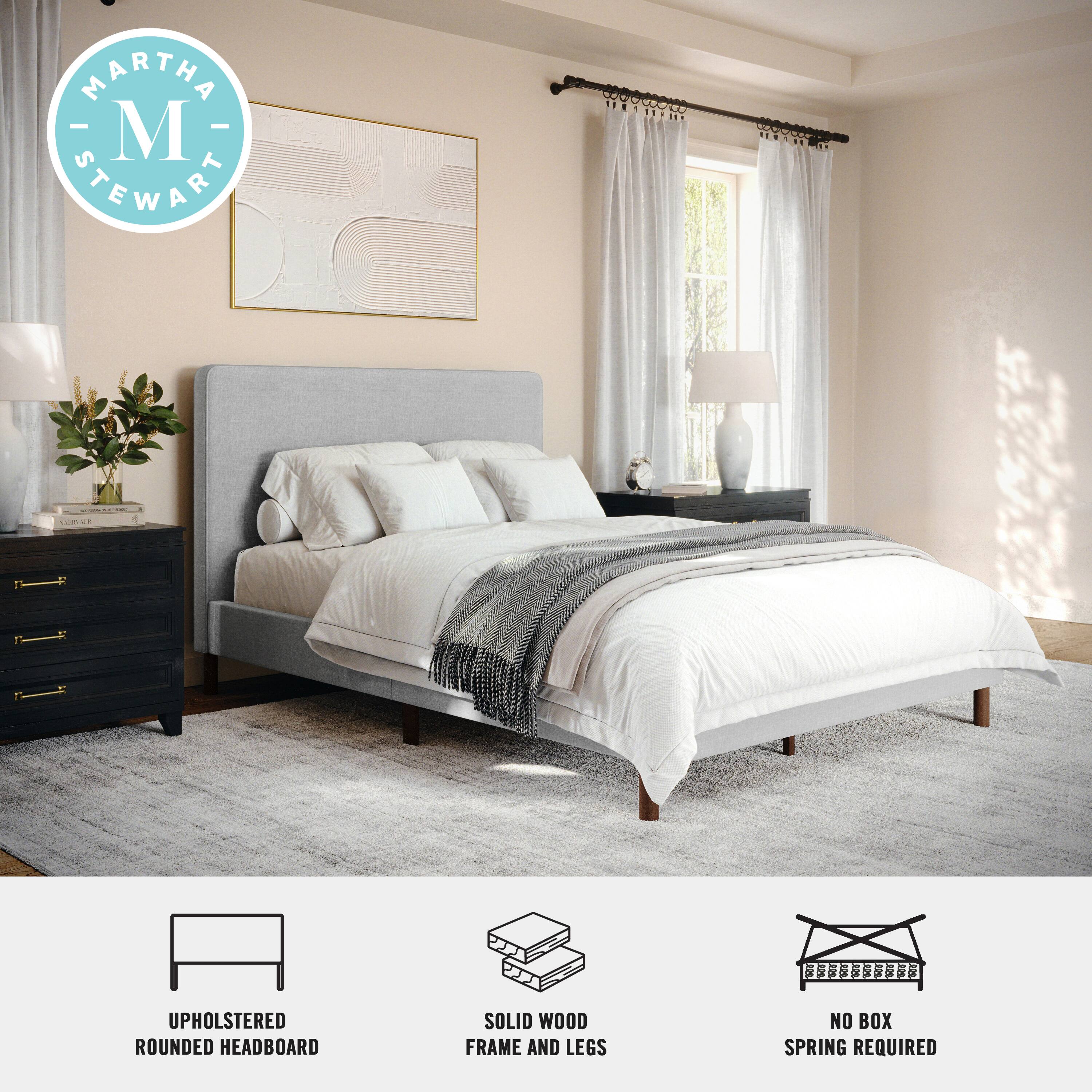 Martha Stewart is the brand associated with this bed. The bed features an upholstered rounded headboard, a solid wood frame, and legs. Additionally, it does not require a box spring.