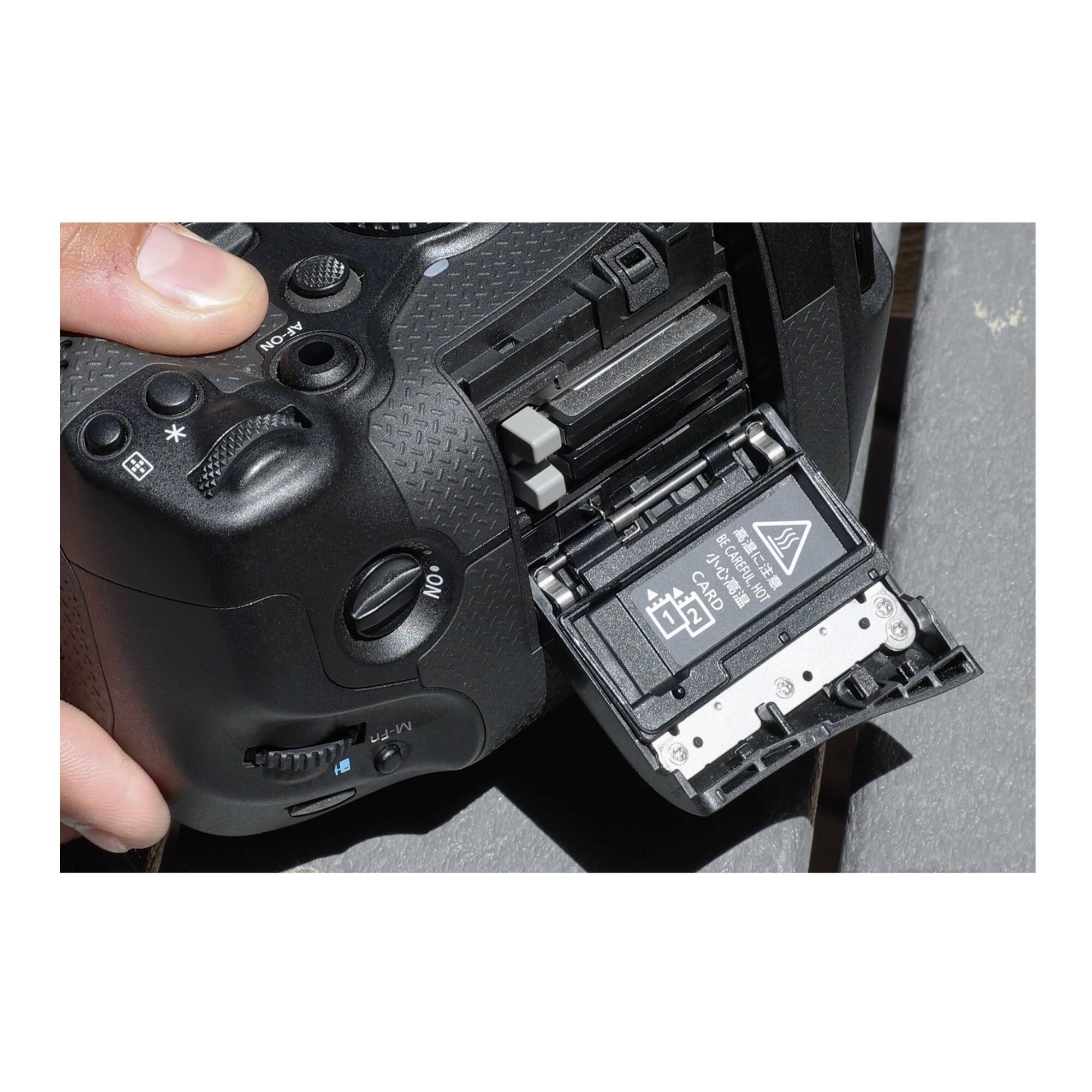 The text on the image reads "AF-ON AF * + NO CARD ECAREFUL HOT 1 2 M-FR."