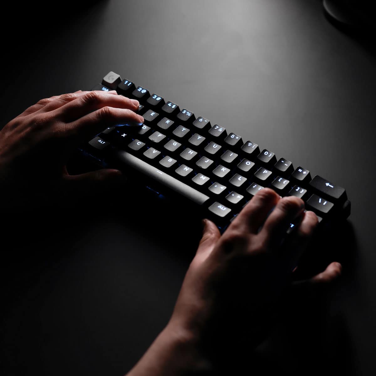 The text on the image reads: "MALT 11 x 2 e 3 4 # E R D F e G V 5 % 6 T 7 & Y 8 . U 9 I H I o J o N K P M L I I ALT - E ( - + 3 , t I I". This text is a combination of various keyboard keys, including letters, numbers, and symbols. It appears to be a collection of random keys, but it does not form any coherent message or pattern.