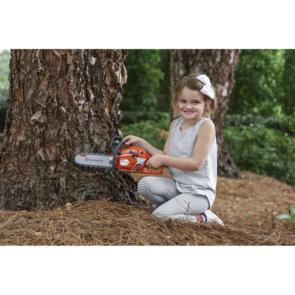 Back. Husqvarna - 550XP Toy Chainsaw with (3) AA Batteries.