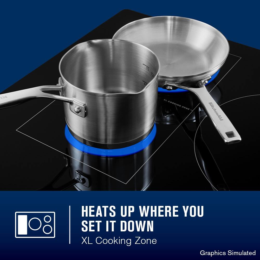 HEATS UP WHERE YOU SET IT DOWN  
XL Cooking Zone  

Graphics Simulated